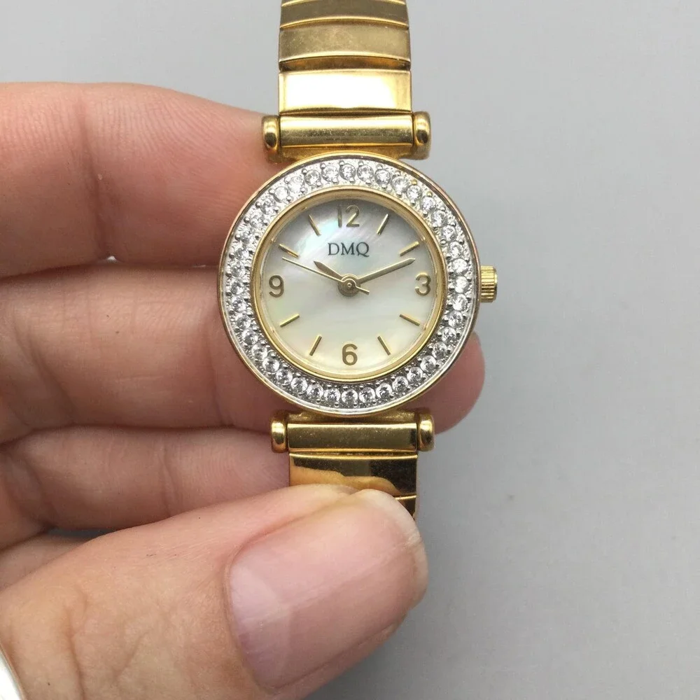 DMQ Womens Watch 24mm MOP Dial Gold Tone Crystals Stretch Band New Battery